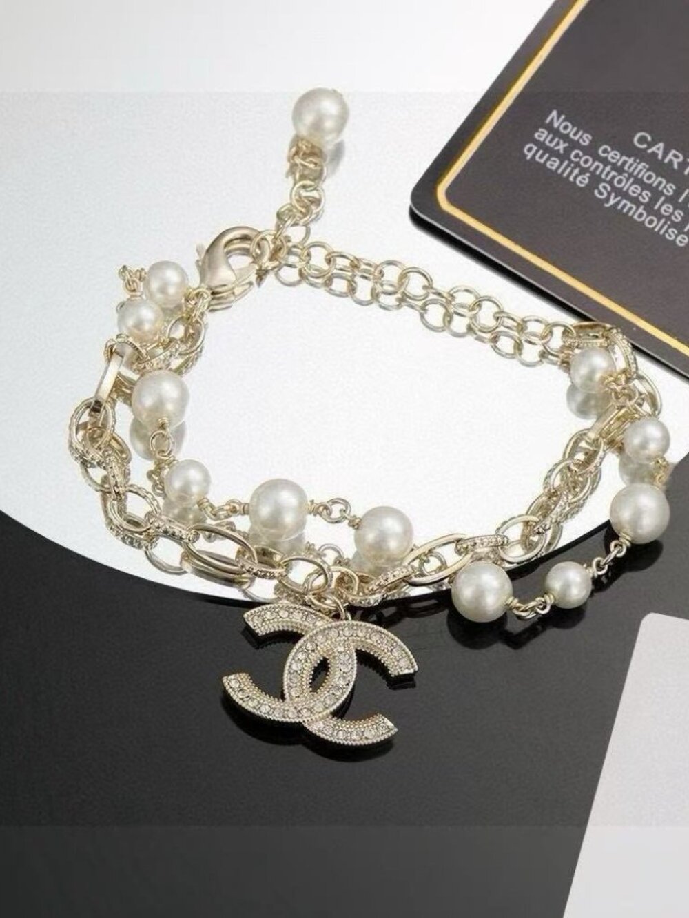 Chanel Multi-Chain Pearl CC Bracelet | Signature Chanel Luxury Jewelry